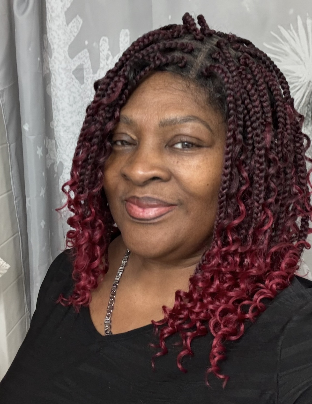 Burgundy and black curly protective hairstyle
