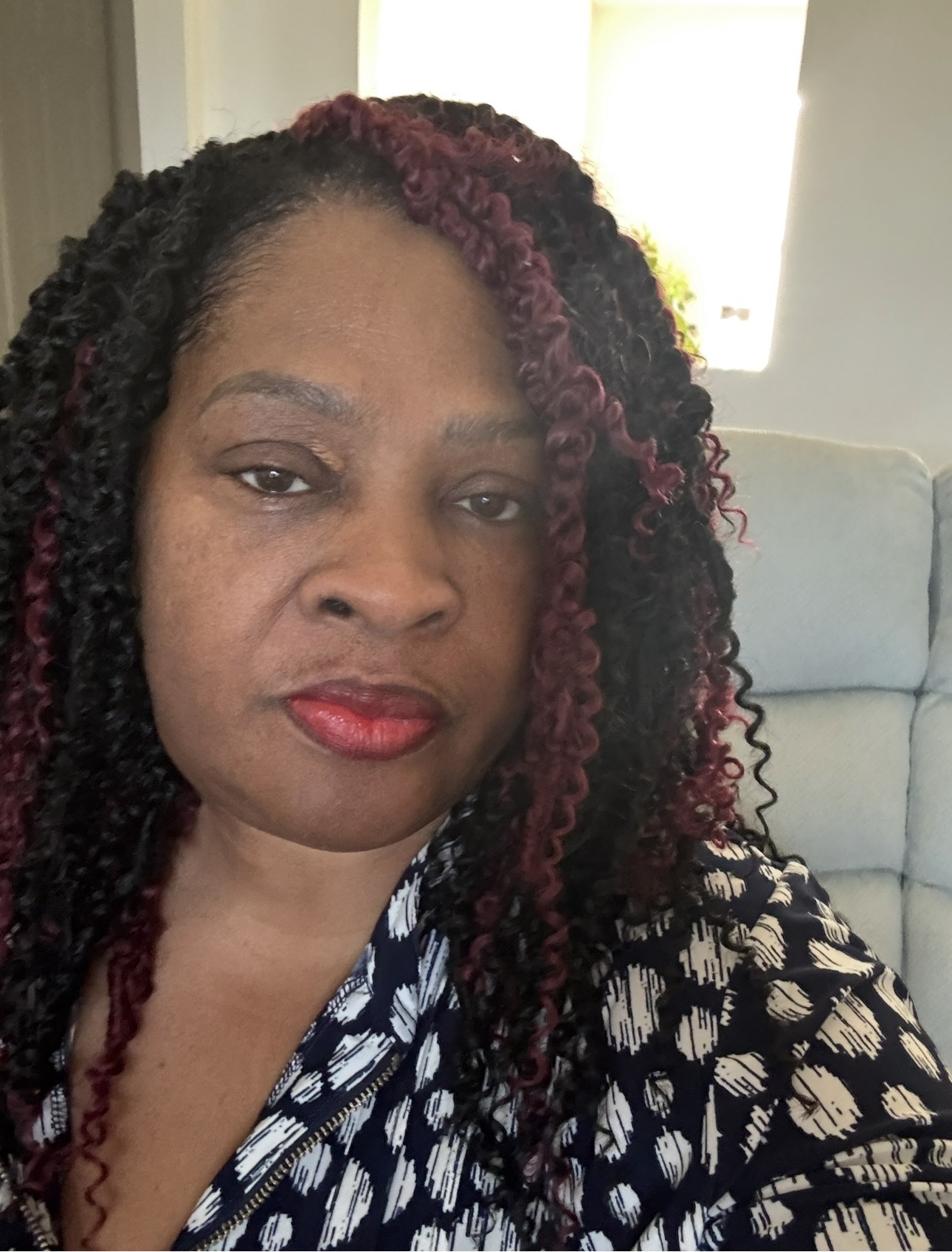 Burgundy curled braids